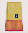 Yellow Kanchivaram Silk Saree with Silver Zari Flower Buttis & Pink Border