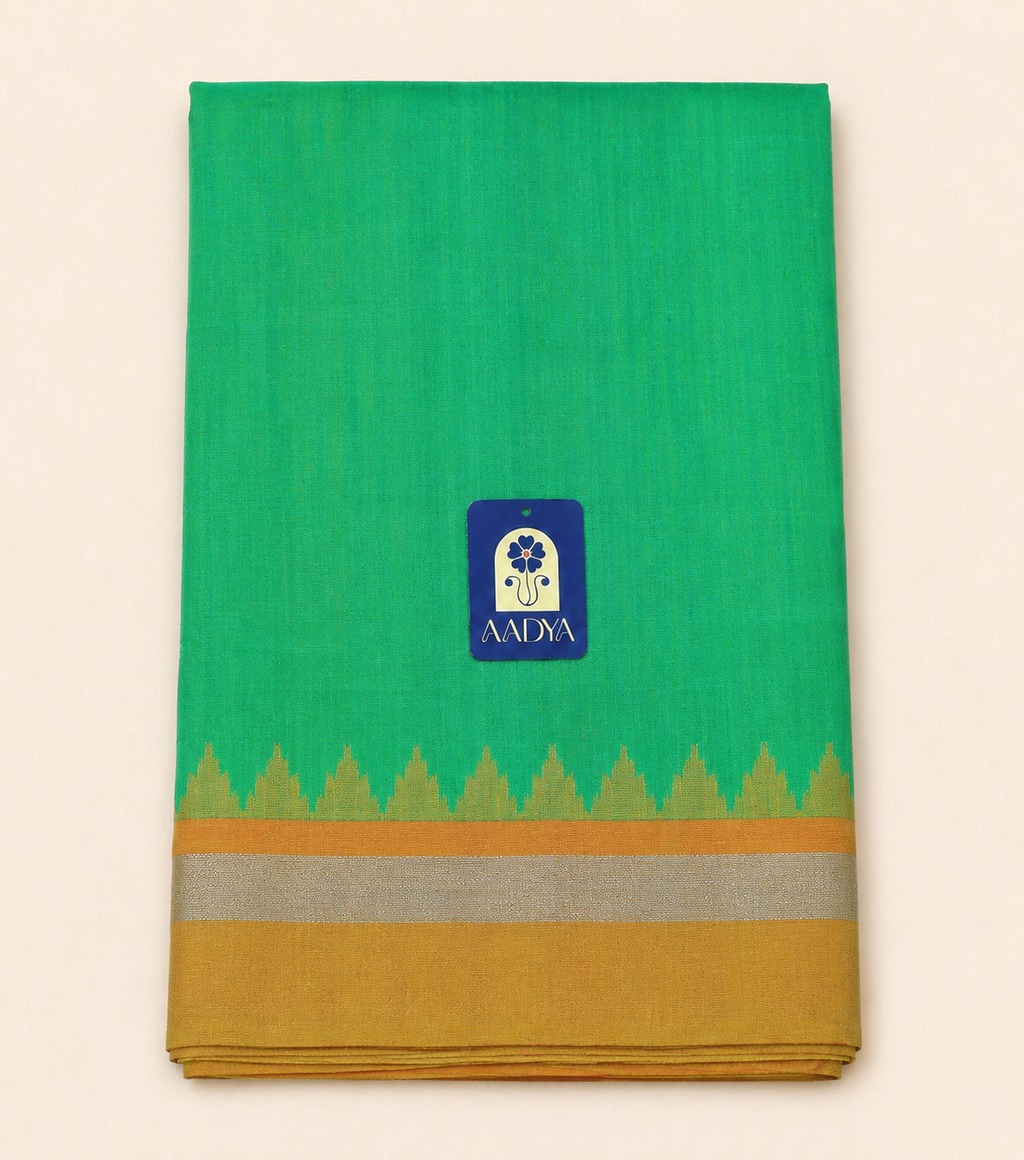 Green Puttapaka Ikkat Silk Saree with Orange & Yellow Ganga Jamuna Border