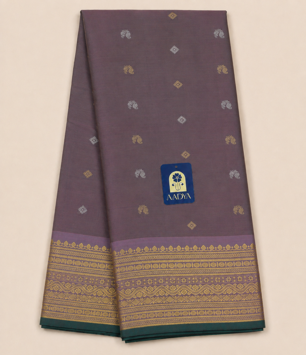 Dusty Mauve Gadwal Twill Silk Saree with Silver & Gold Diamond and Peacock Buttis