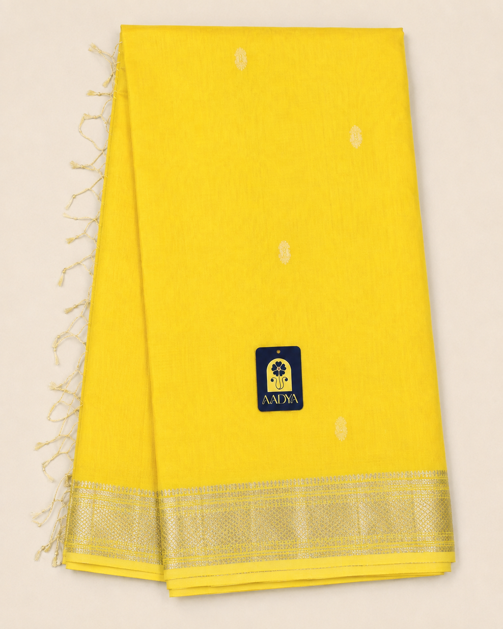 Yellow Maheshwari Silk Saree with White Thread Flower Buttis & Silver Zari Border