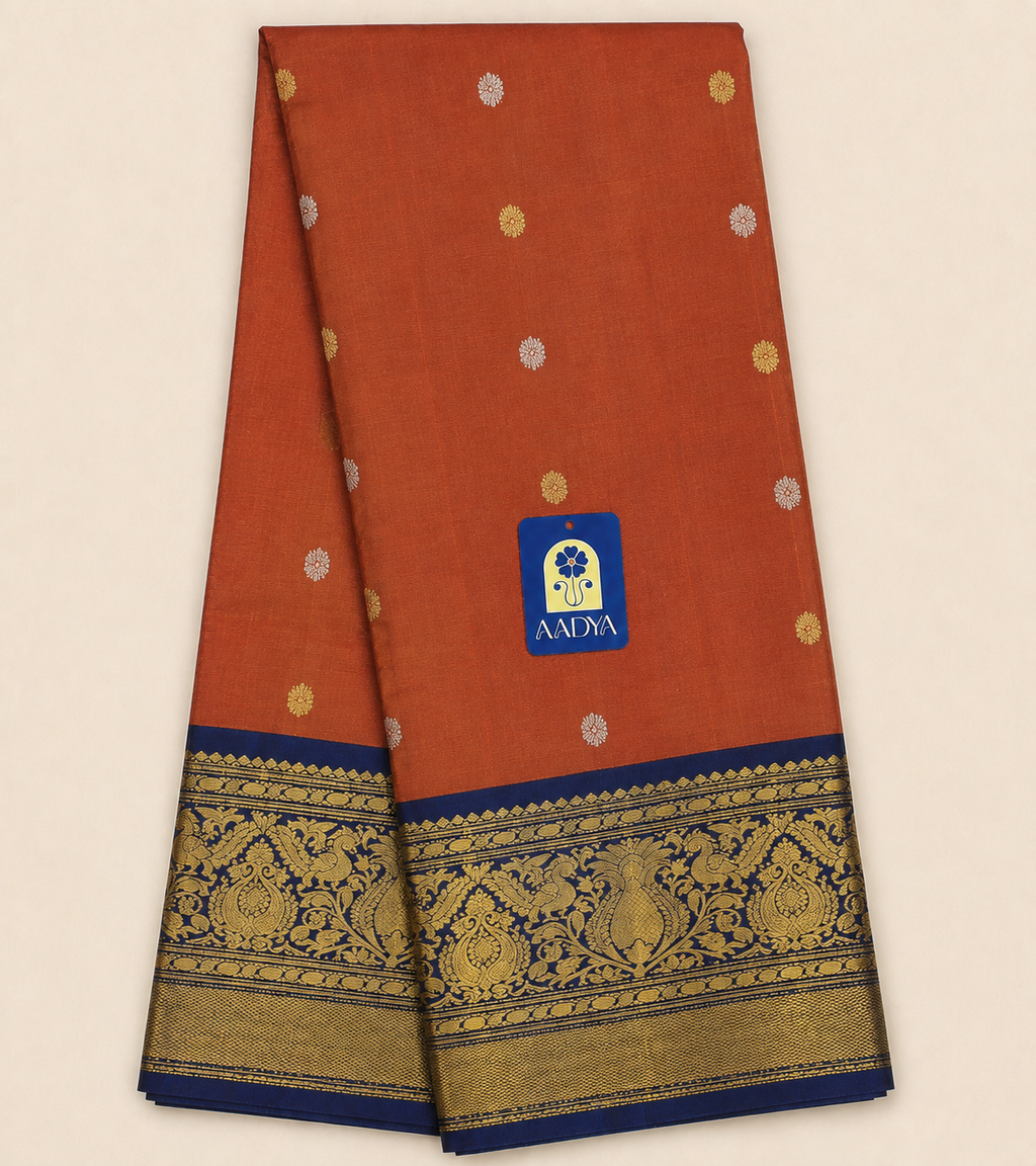 Orange Gadwal Silk Saree with Gold & Silver Flower Buttis and Navy Blue Bird Motif Zari Border