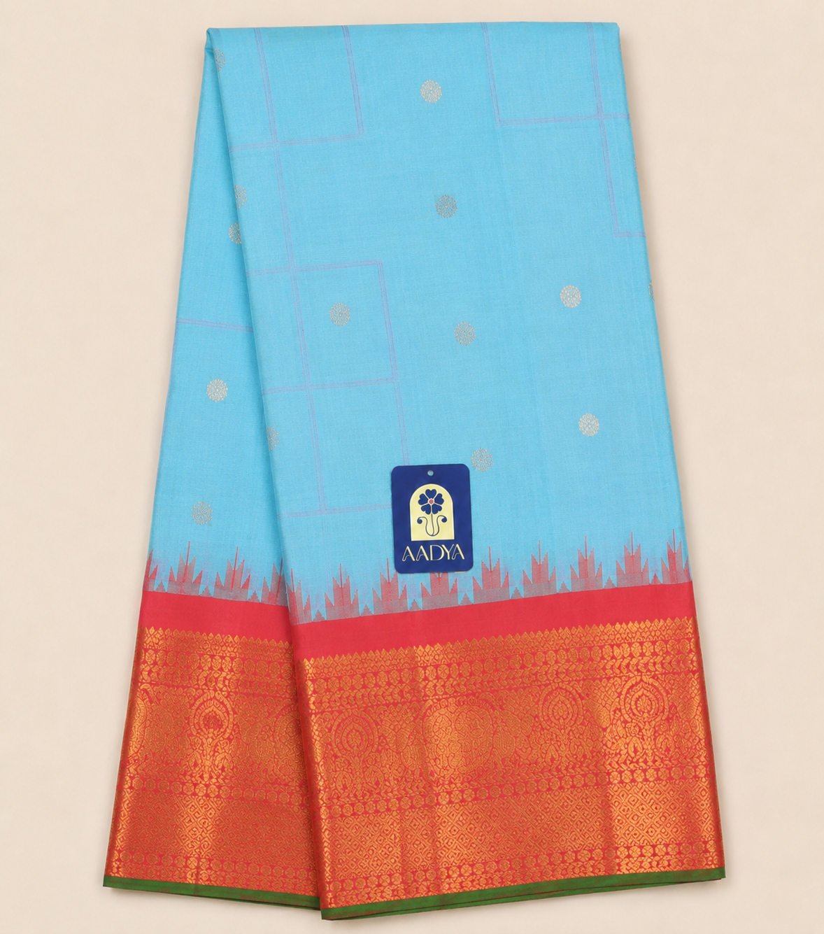 Gadwal Silk Saree in Powder Blue with Silver Peacock Buttis & Rani Pink Temple Border