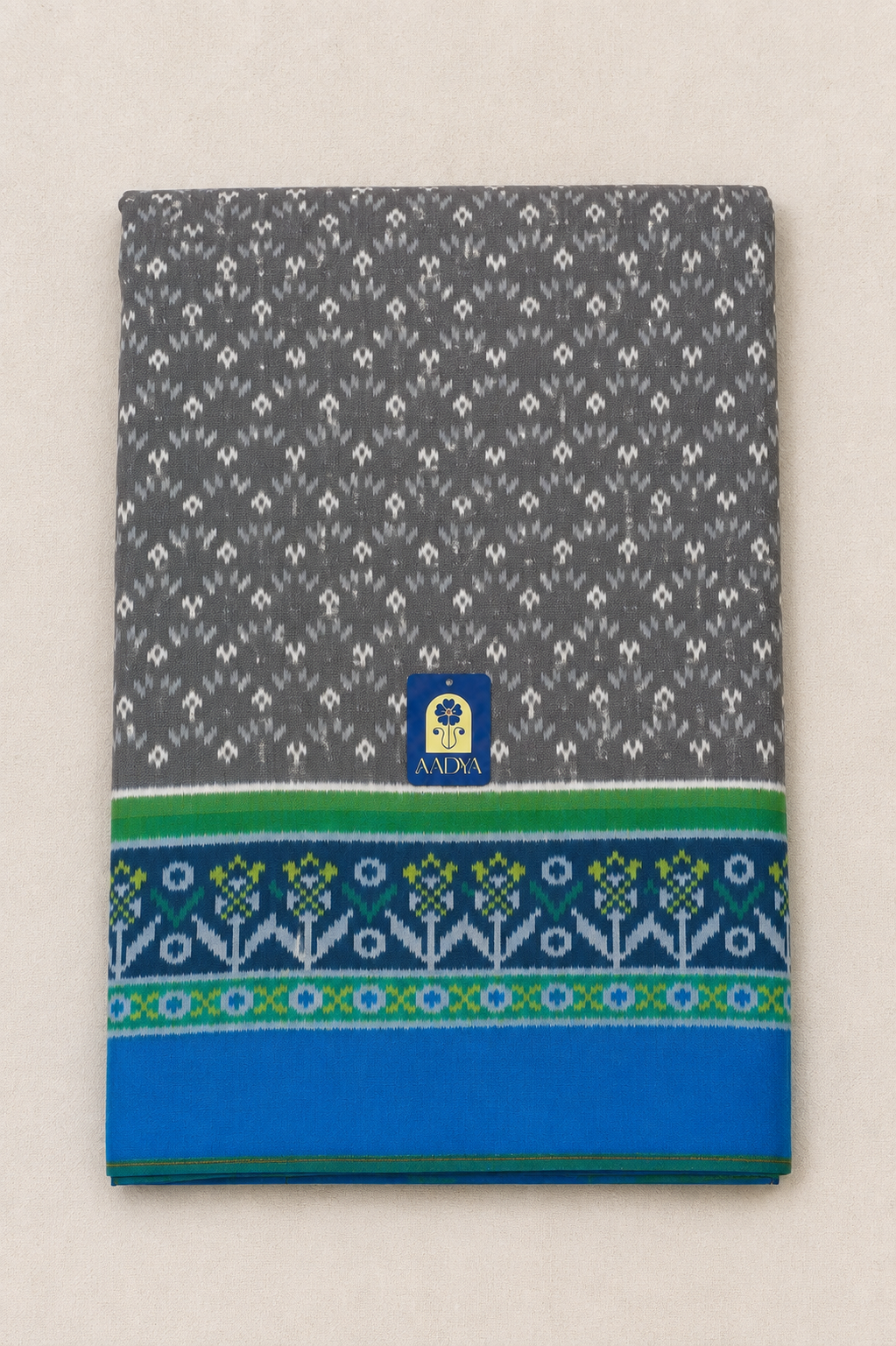 Grey Puttapaka Ikkat Silk Saree with Ikkat Work, Peacock Green Border & Designer Pallu