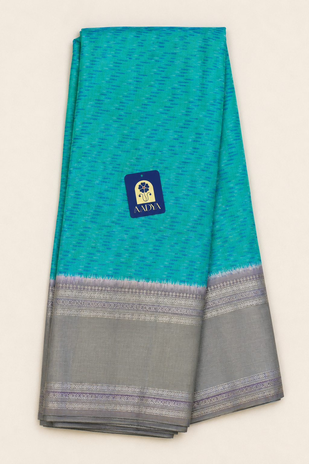 Green Puttapaka Ikkat Eri Silk Saree with Silver Butti Border & Grey Pallu