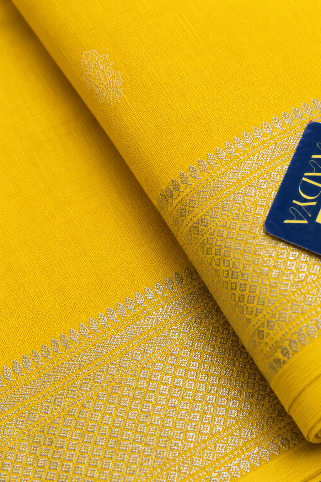 Yellow Maheshwari Silk Saree with White Thread Flower Buttis & Silver Zari Border