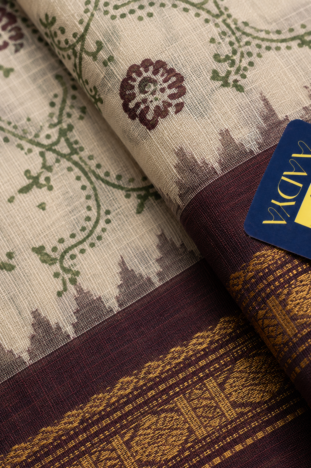 White Gadwal Cotton Saree with Hand-Printed Floral Motifs & Maroon Zari Border
