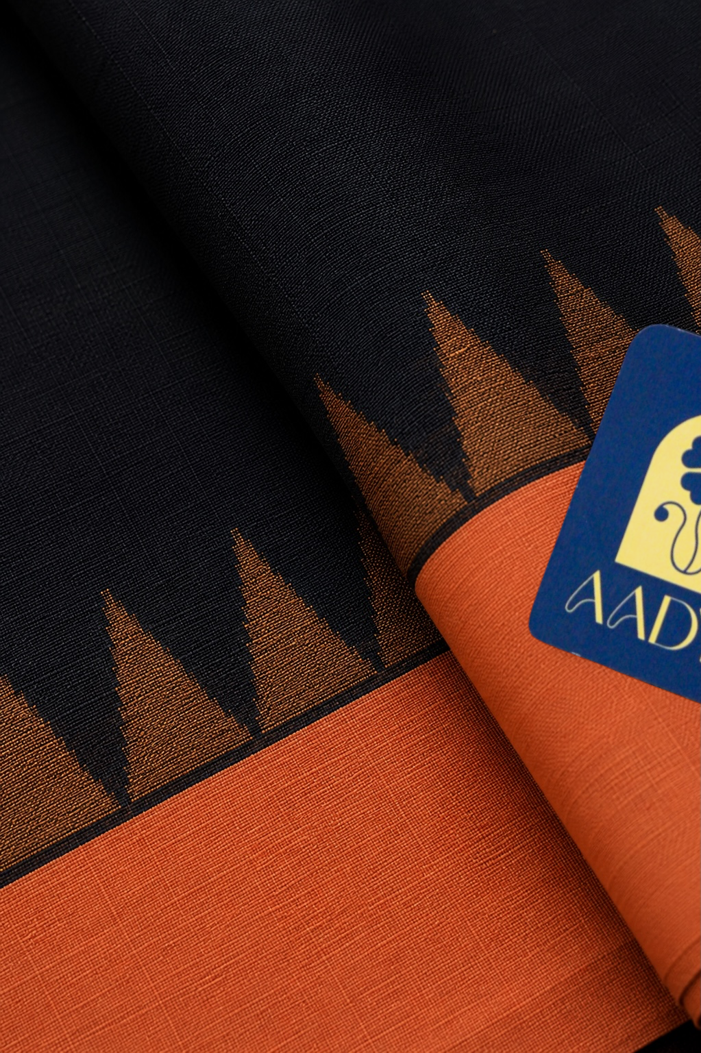 Black Gadwal Silk Saree with Orange Temple Design Border & Plain Pallu