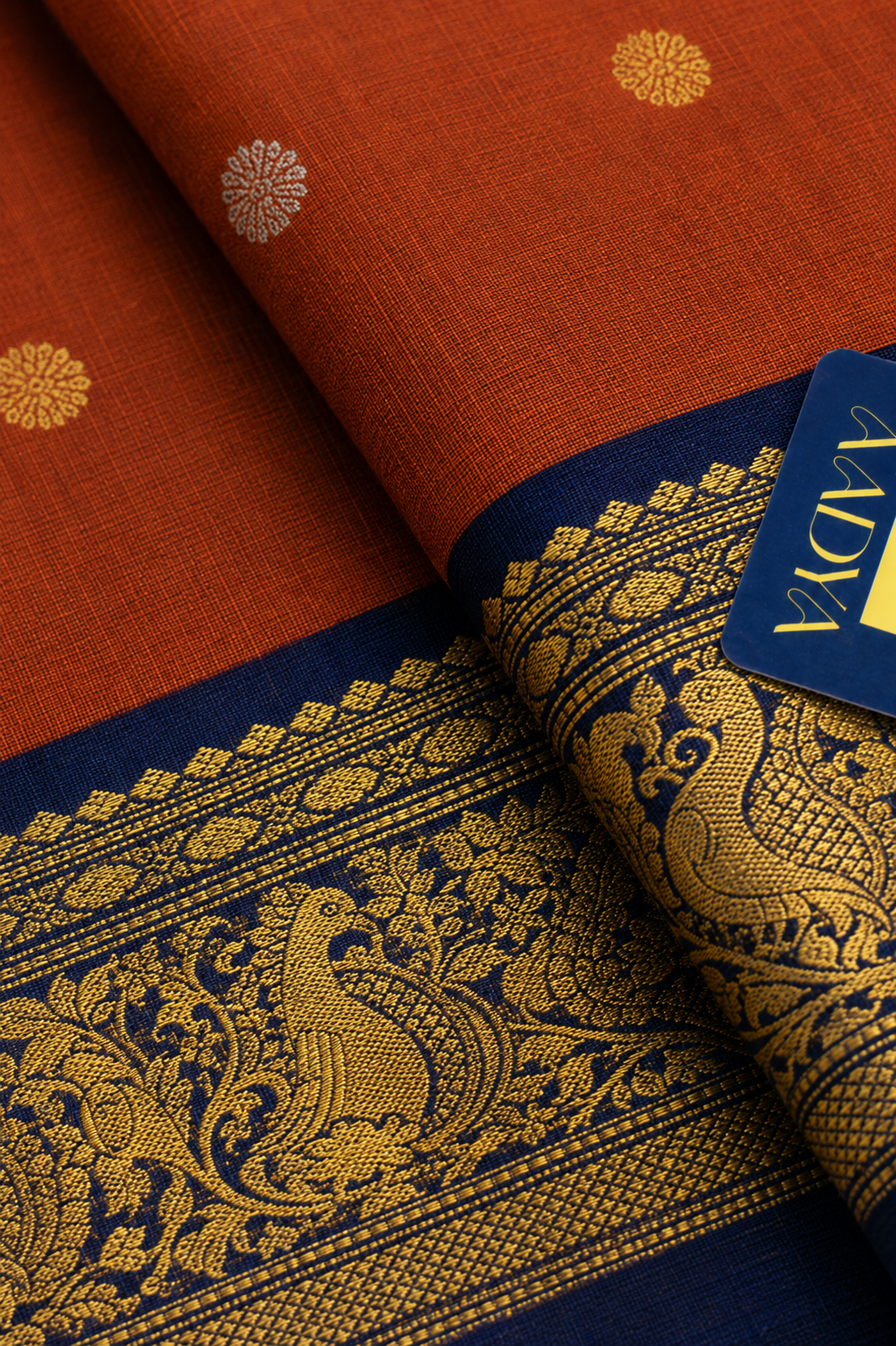 Orange Gadwal Silk Saree with Gold & Silver Flower Buttis and Navy Blue Bird Motif Zari Border