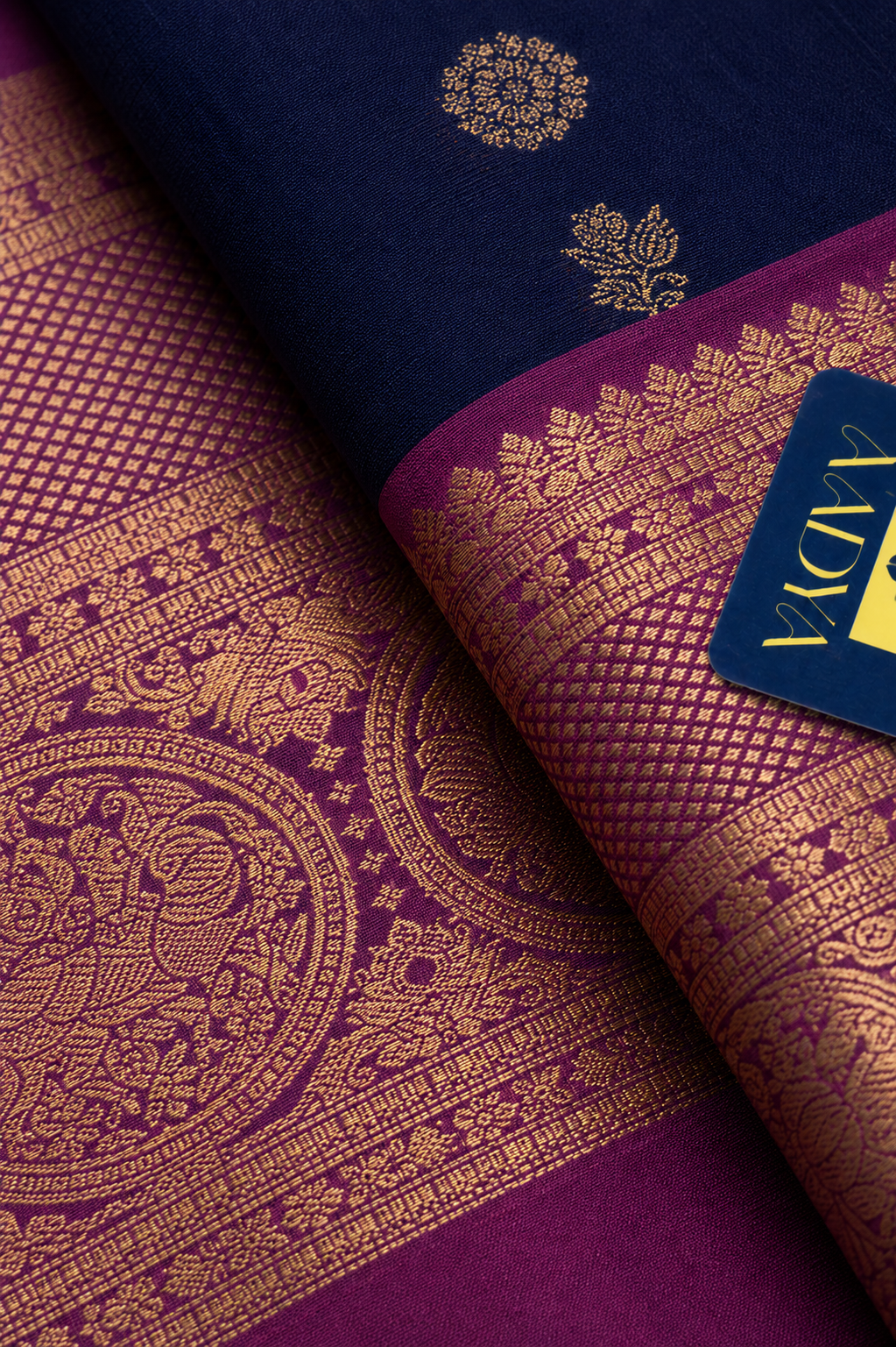 Dark Blue Gadwal Silk Saree with Flower Zari Buttis, Purple Peacock & Leaf Motif Border