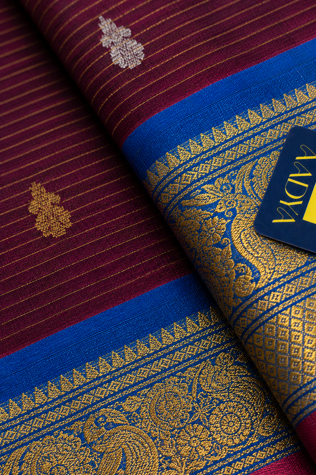 Magenta Gadwal Sico Saree with Gold & Silver Thread Flower Buttis and Peacock Blue Zari Border