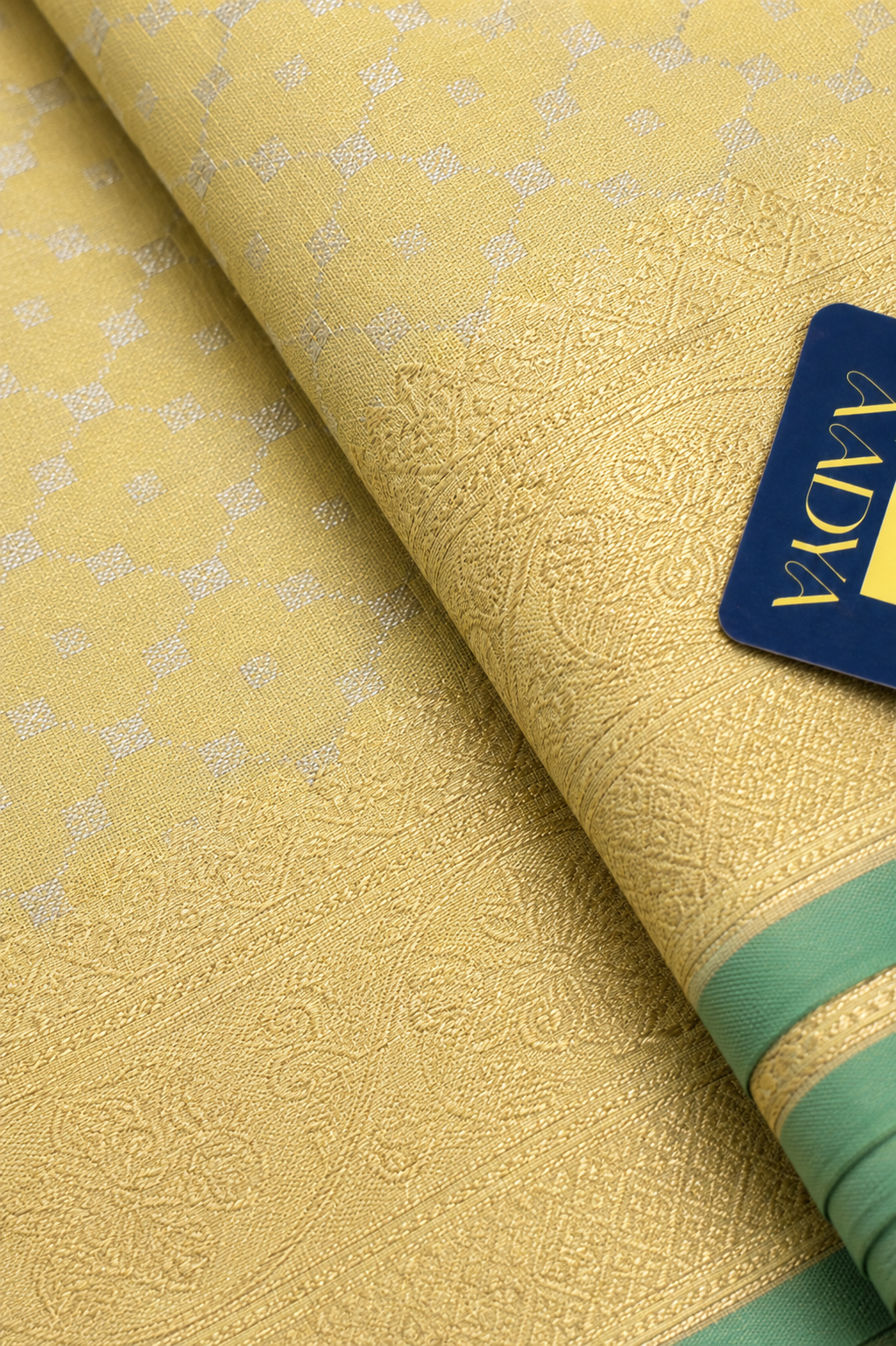 Light Yellow Banaras Silk Saree with Silver & Gold Zari Border and Green Selvage