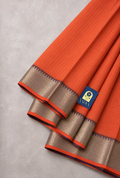 Peach Mangalgiri Sico Saree with Checks & Purple Silver Zari Border