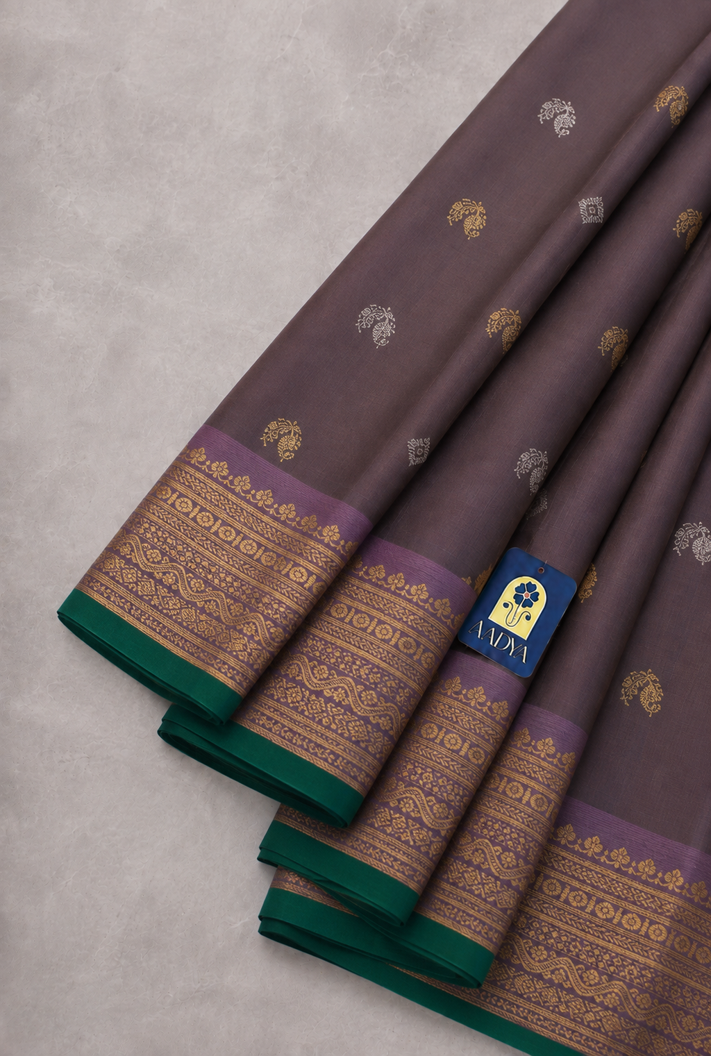 Dusty Mauve Gadwal Twill Silk Saree with Silver & Gold Diamond and Peacock Buttis