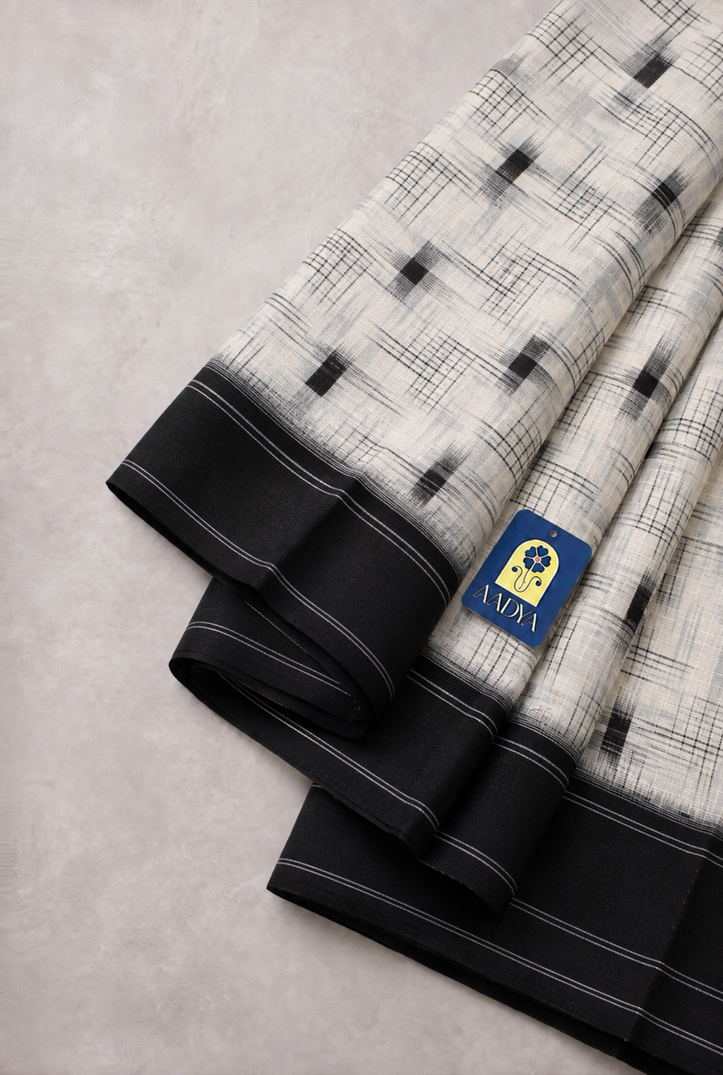 Off White Puttapaka Ikkat Cotton Saree with Geometric Motifs, Black Border & Designer Pallu