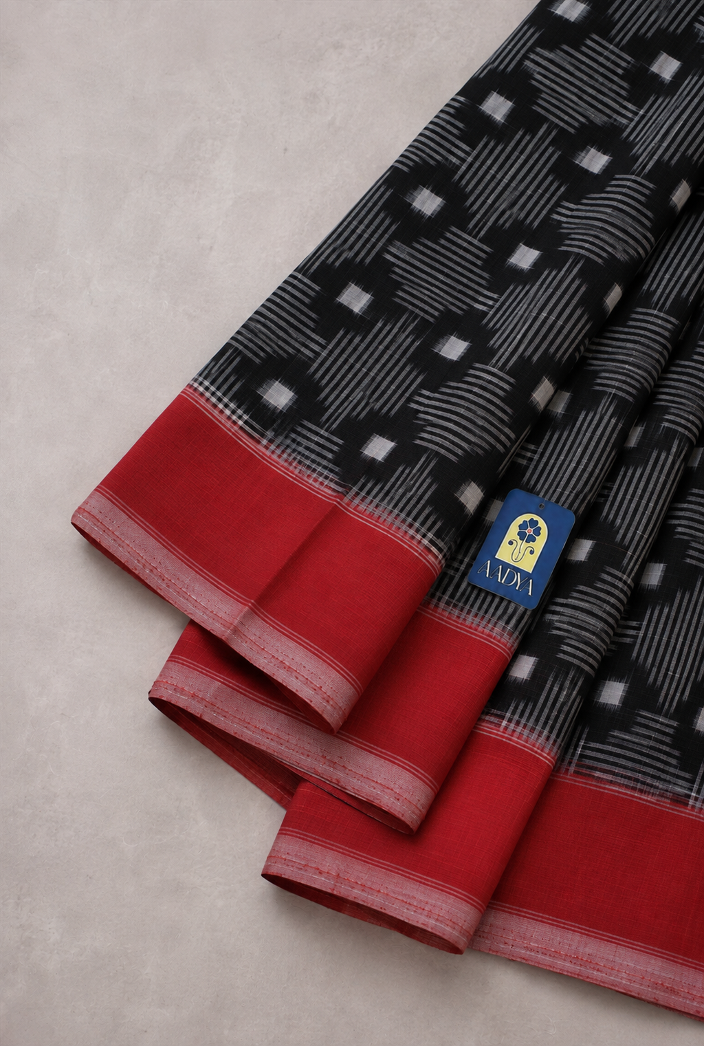 Deep Black Double Ikkat Cotton Saree with Geometric Ikat Pattern & Red Border