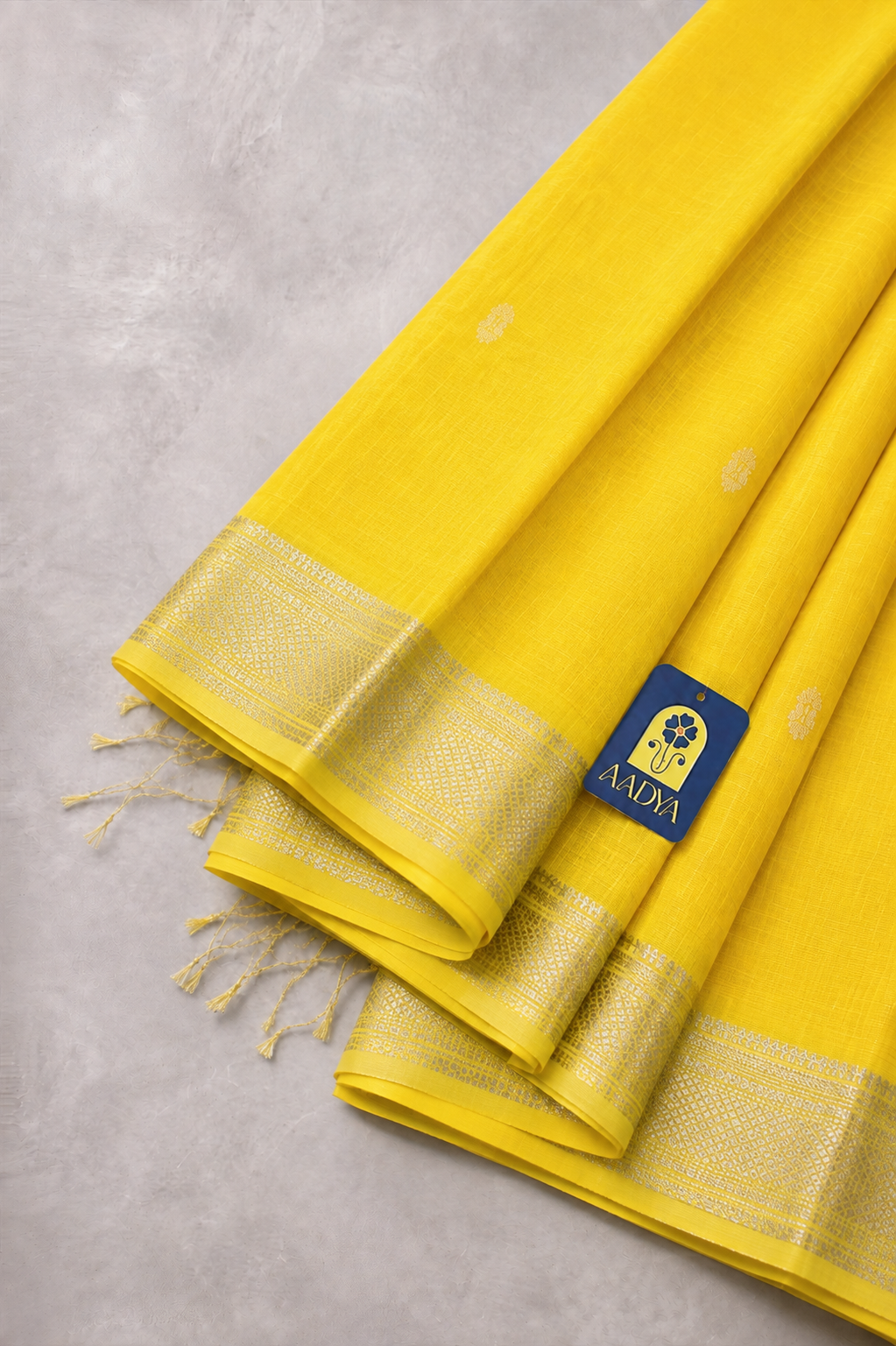 Yellow Maheshwari Silk Saree with White Thread Flower Buttis & Silver Zari Border