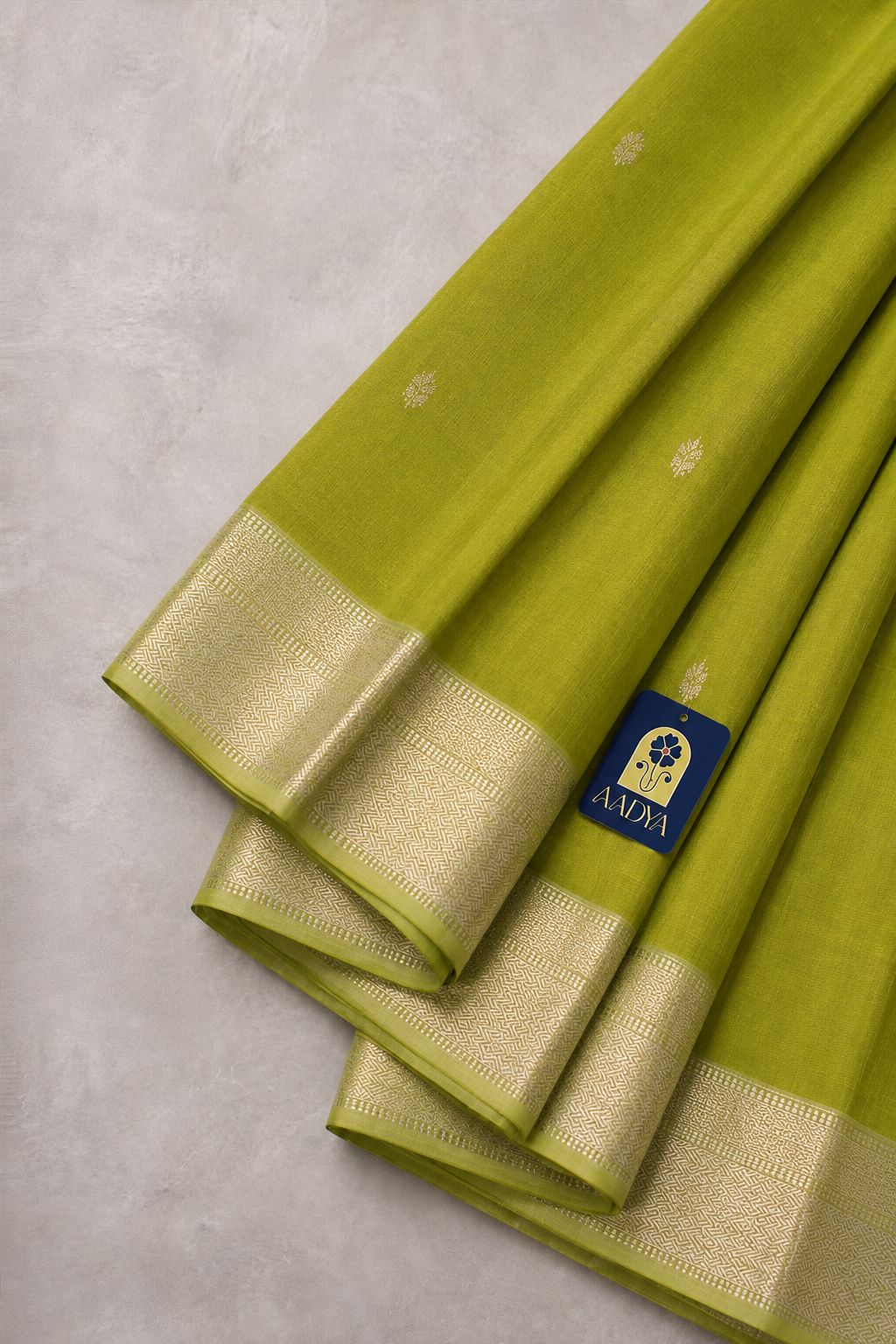Green Maheshwari Silk Saree with Silver Zari Buttis & Border