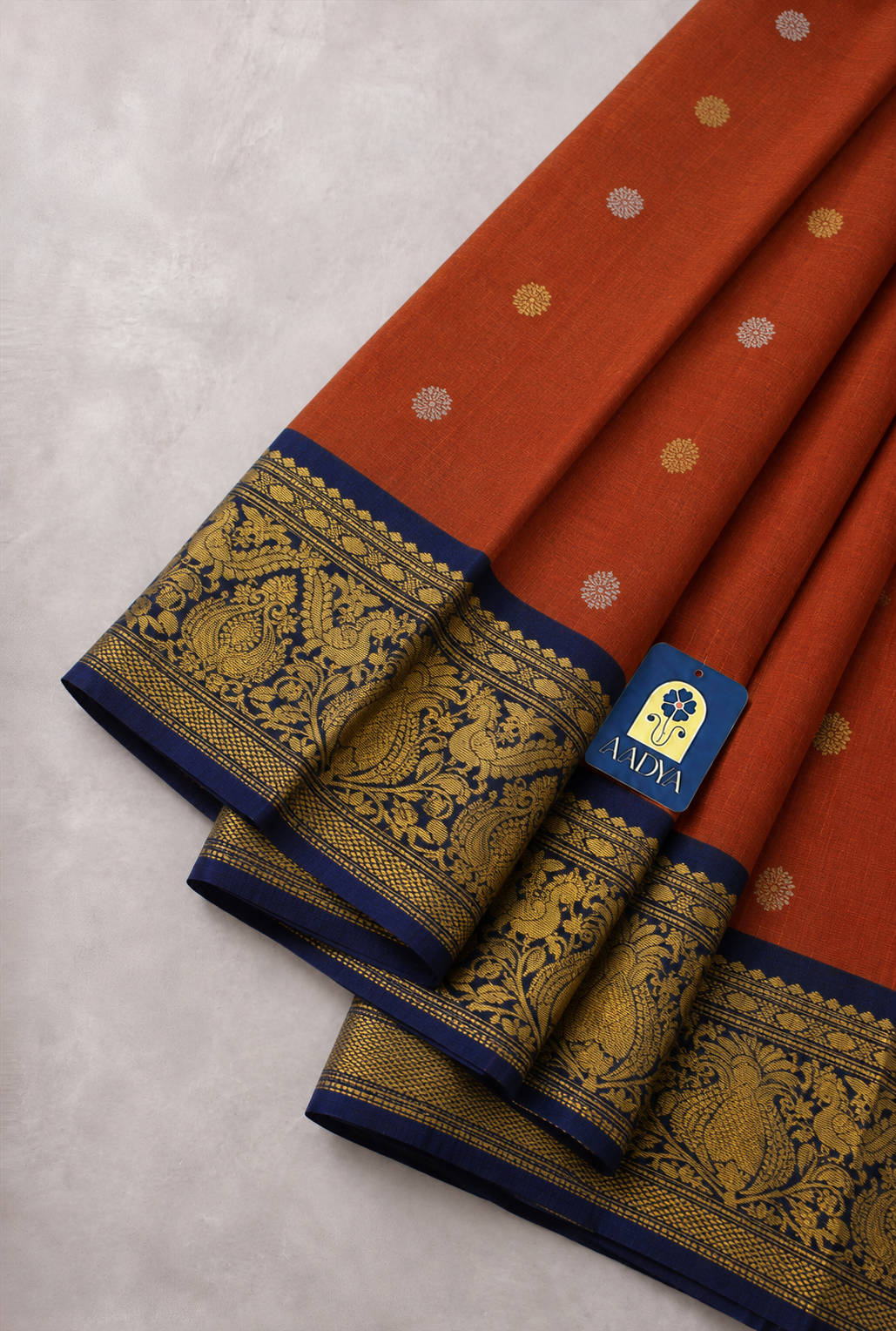Orange Gadwal Silk Saree with Gold & Silver Flower Buttis and Navy Blue Bird Motif Zari Border