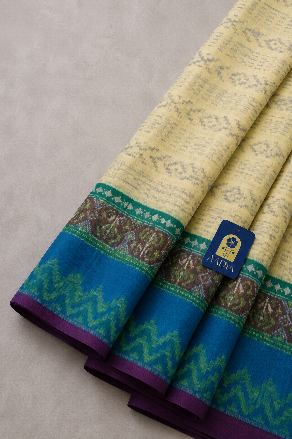 Cream Patola Eri Silk Saree with Peacock Blue Wave Border & Blue-Green Patola Pallu