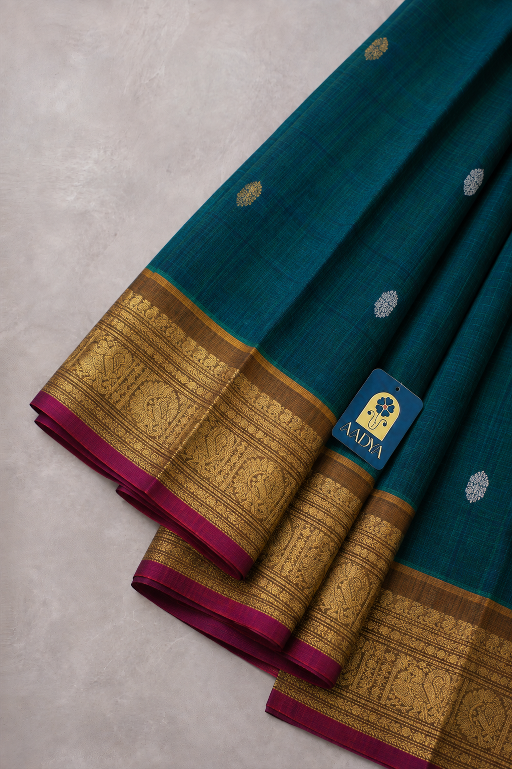 Green Gadwal Silk Saree with Silver & Gold Peacock Round Buttis and Mustard Yellow Zari Border