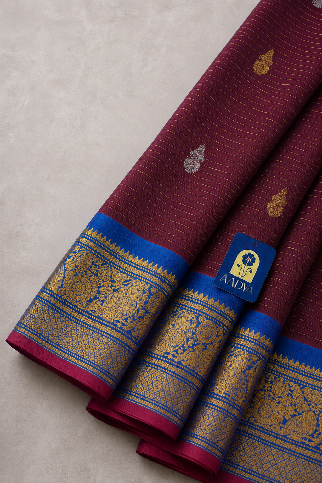 Magenta Gadwal Sico Saree with Gold & Silver Thread Flower Buttis and Peacock Blue Zari Border