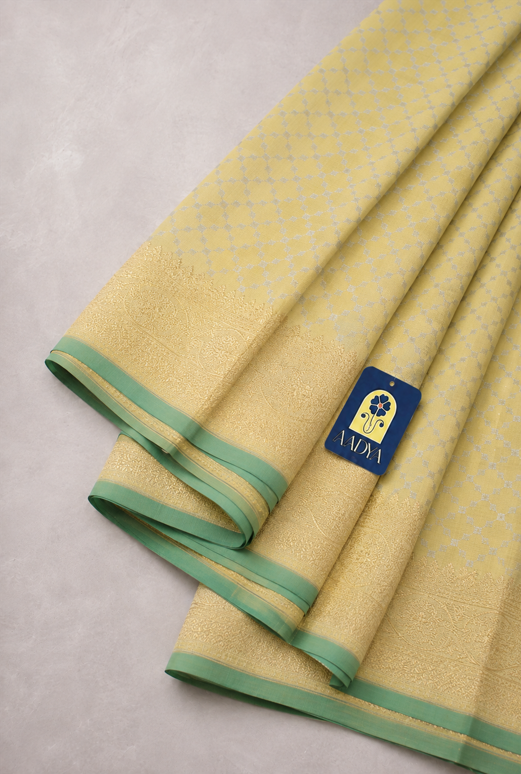 Light Yellow Banaras Silk Saree with Silver & Gold Zari Border and Green Selvage
