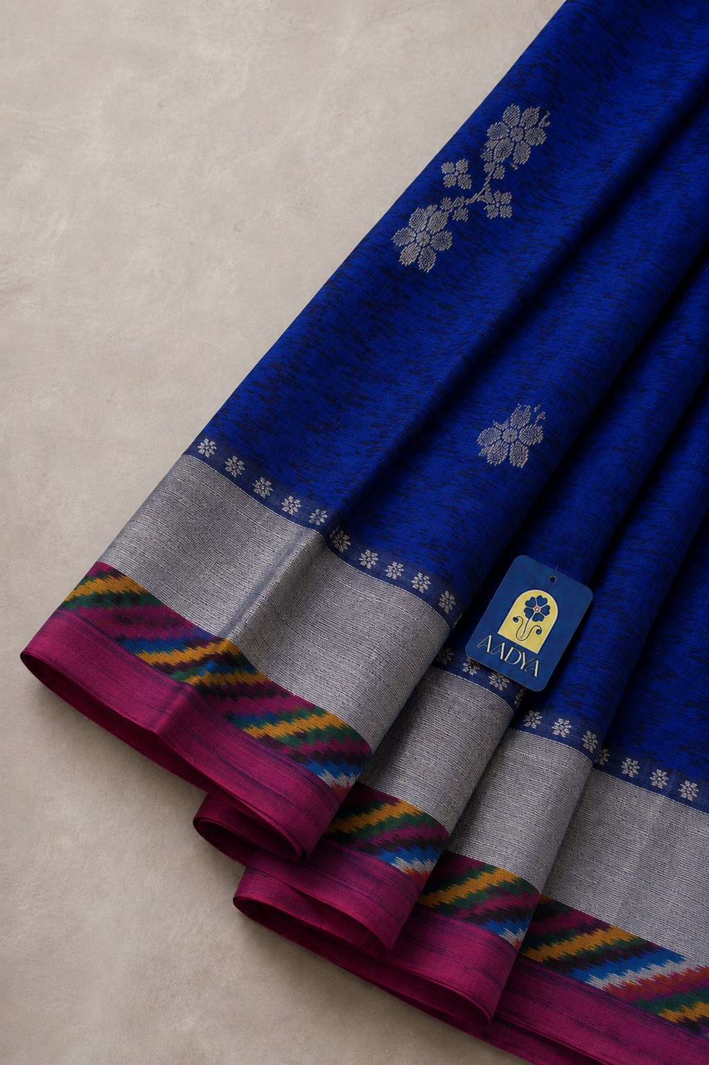 Navy Blue Puttapaka Ikkat Eri Silk Saree with Flower Buttis & Silver Zari Border