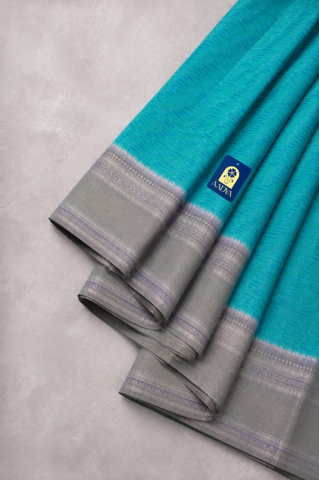 Green Puttapaka Ikkat Eri Silk Saree with Silver Butti Border & Grey Pallu