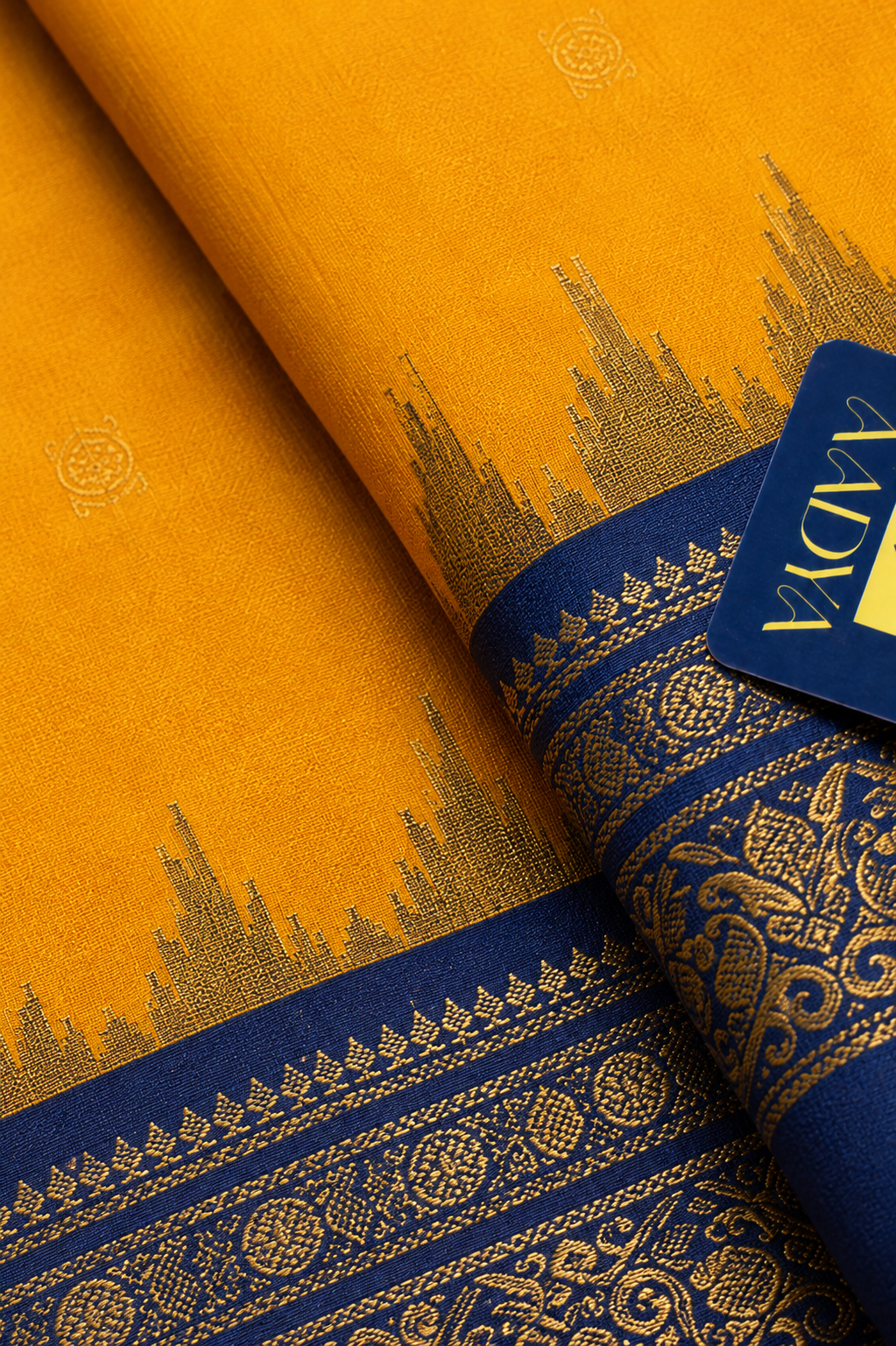 Yellow Gadwal Silk Saree with Zari Buttis & Navy Blue Floral Zari Border