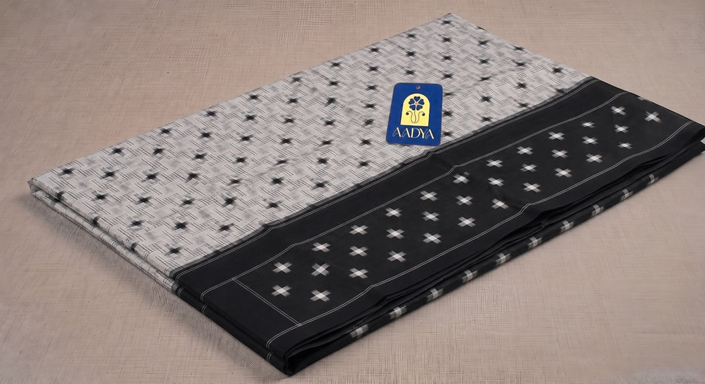 Off White Puttapaka Ikkat Cotton Saree with Geometric Motifs, Black Border & Designer Pallu