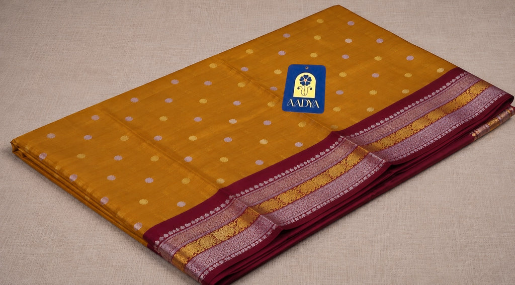 Orange Gadwal Sico Saree with Zari Lines, Peacock Zari Buttis & Maroon Zari Border
