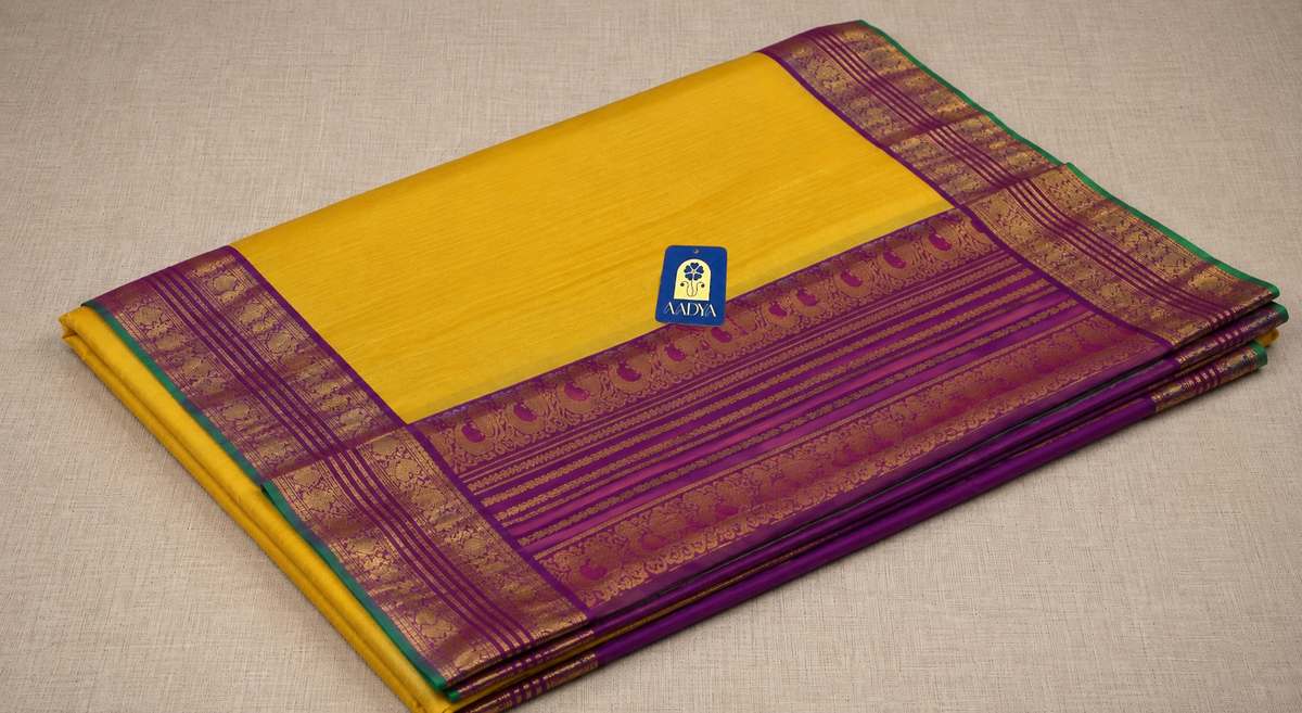 Yellow Gadwal Twill Silk Saree with 2GM Gold Zari & Rani Pink Bird Zari Border