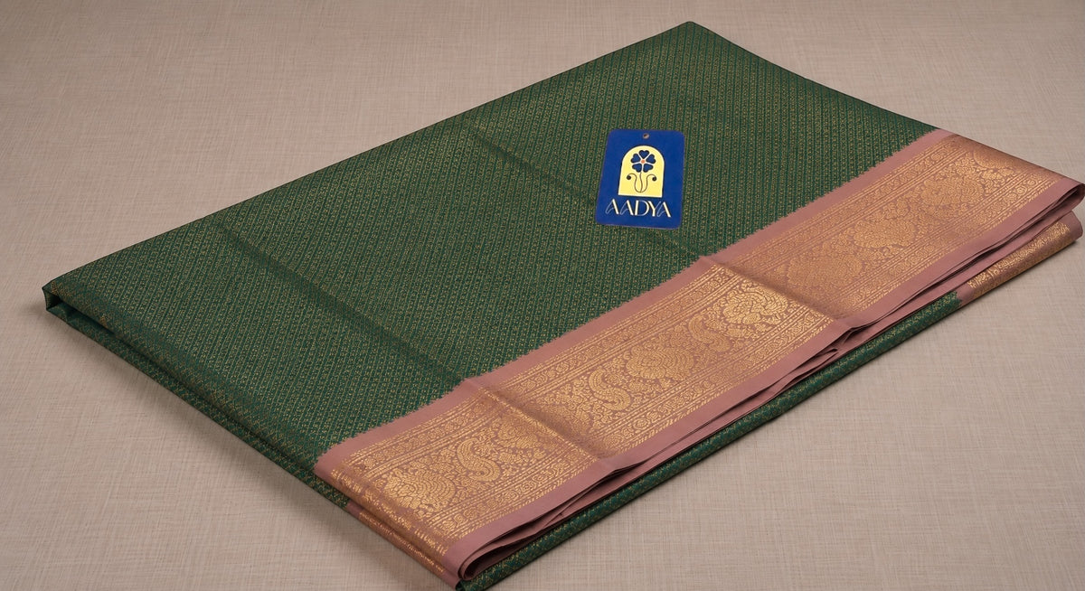 Green Gadwal Silk Saree with Diamond-Shaped Zari Design and Baby Pink Bird Motif Border