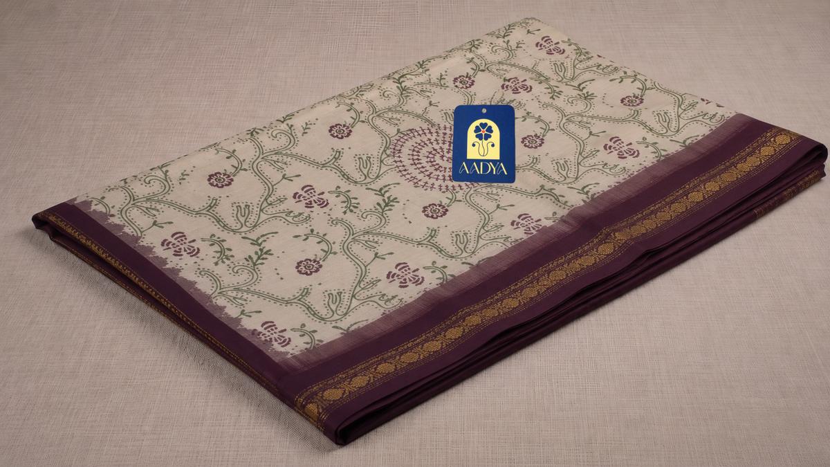 White Gadwal Cotton Saree with Hand-Printed Floral Motifs & Maroon Zari Border