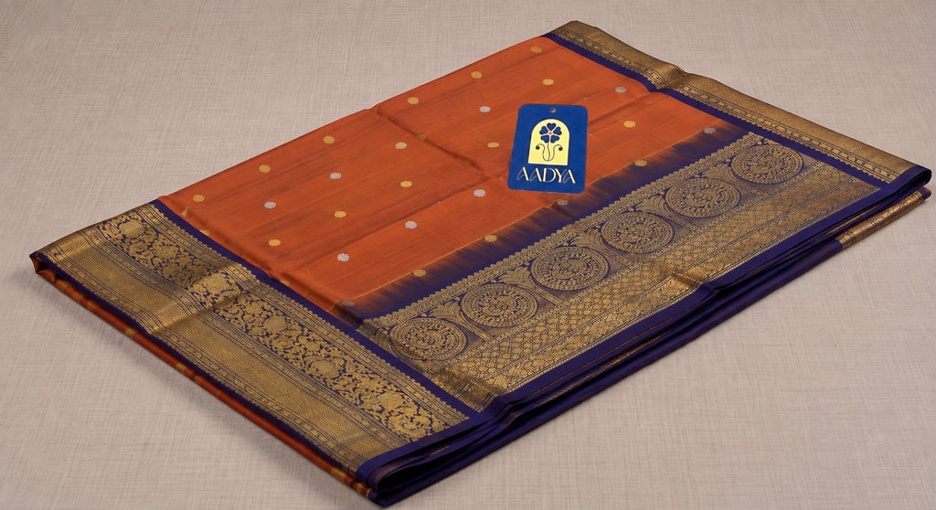 Orange Gadwal Silk Saree with Gold & Silver Flower Buttis and Navy Blue Bird Motif Zari Border