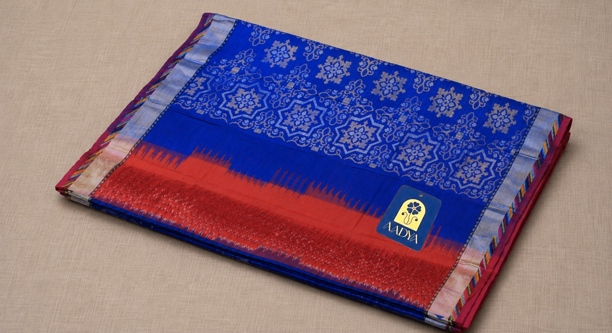Navy Blue Puttapaka Ikkat Eri Silk Saree with Flower Buttis & Silver Zari Border