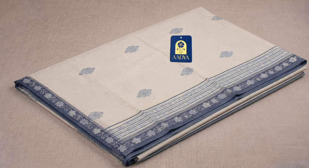 White Khadi Cotton Saree with Silver Floral Kashmir Work & Sea Blue Border