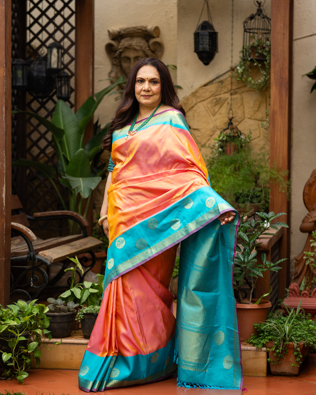 Peach Pink and Turquoise Blue Silk Saree with Gold Butta Motifs and Contrast Border
