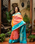 Peach Pink and Turquoise Blue Silk Saree with Gold Butta Motifs and Contrast Border