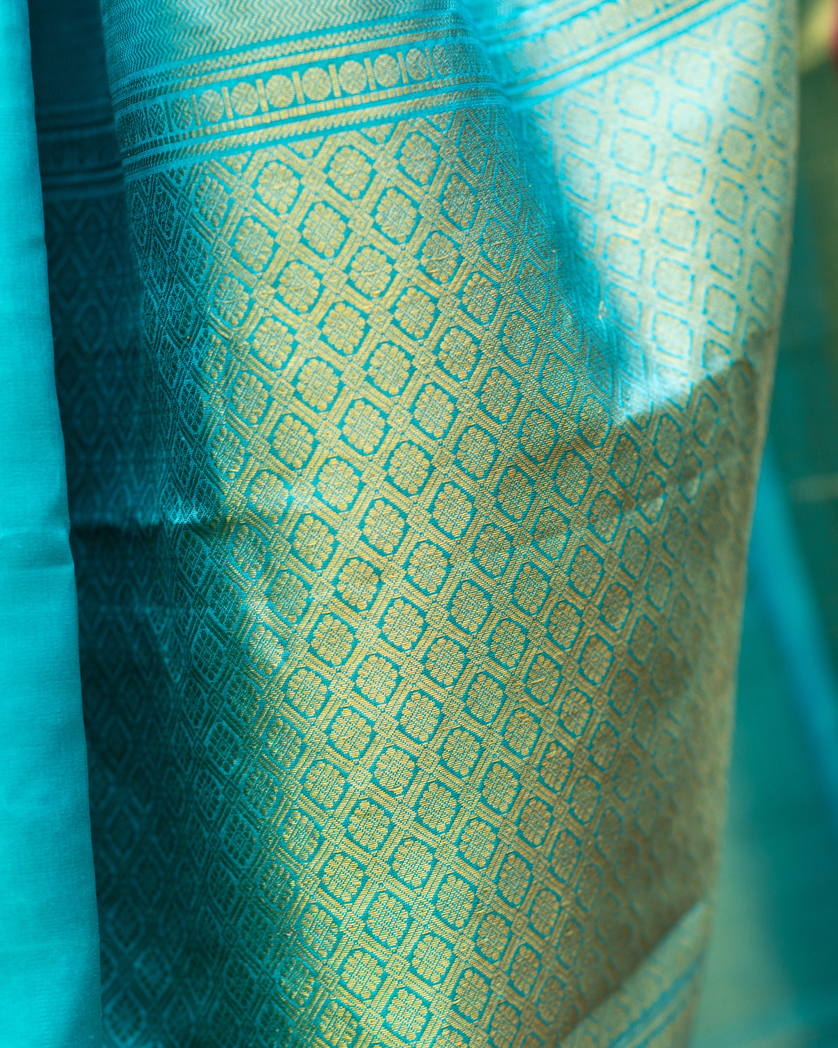 Peach Pink and Turquoise Blue Silk Saree with Gold Butta Motifs and Contrast Border
