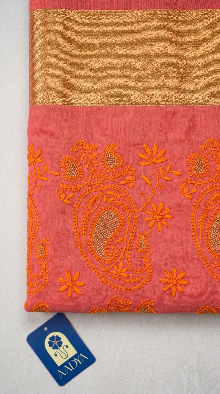Pink Chanderi Silk Saree with Orange Floral Meenakari Buttis & Zari Pallu