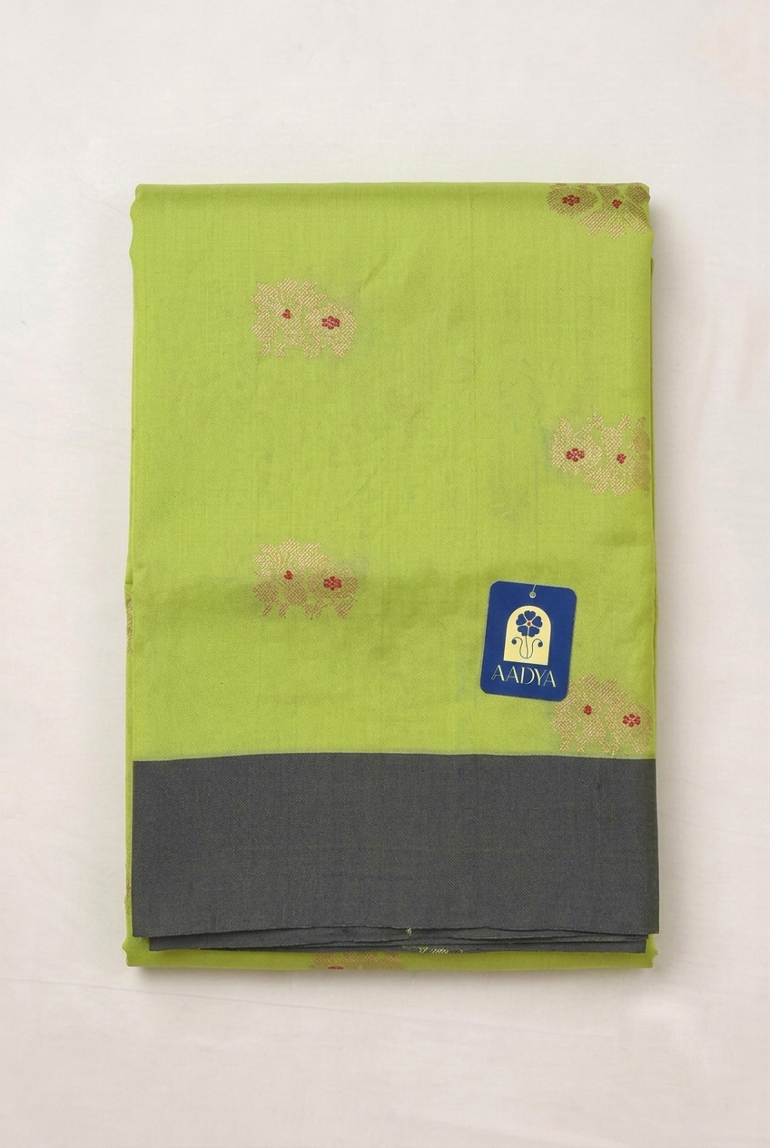 Green Chanderi Silk Saree with Sparrow Zari Buttis & Blue Border
