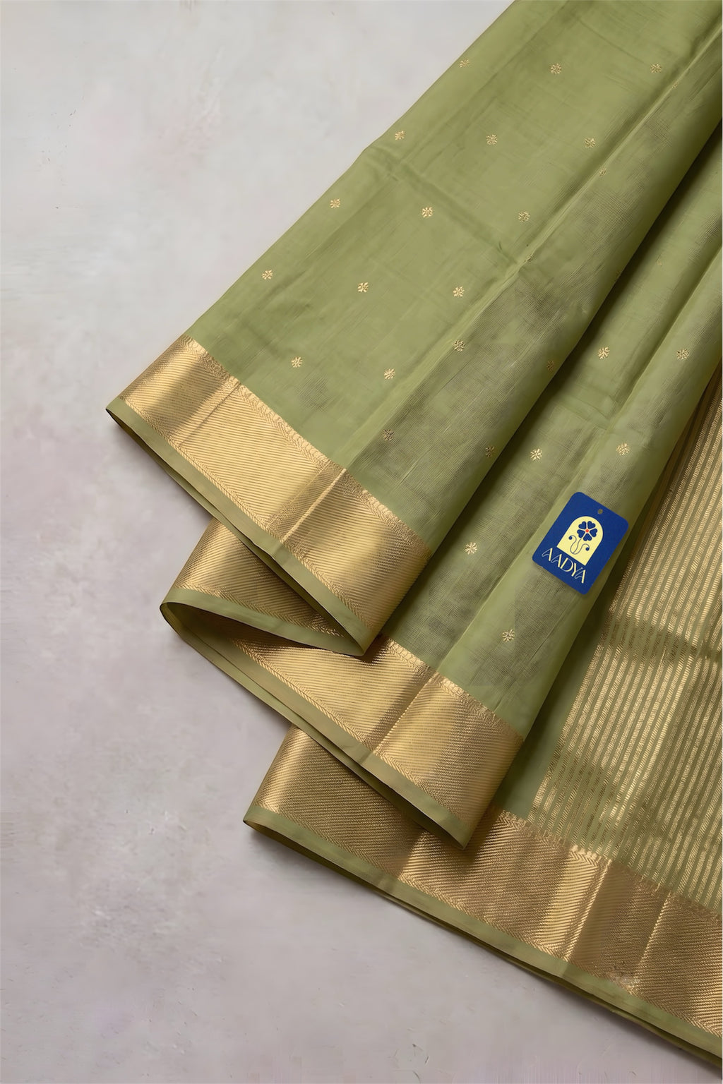 Pista Green Chanderi Silk Saree with Flower Buttis & Navy Blue Zari Border