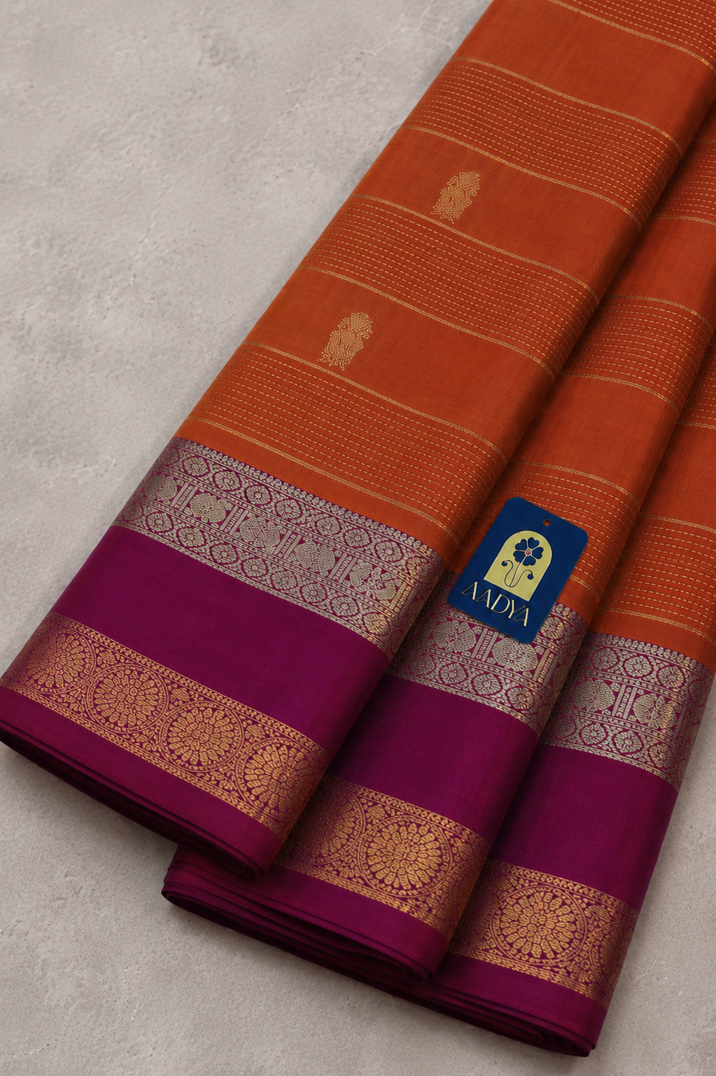 Mustard Orange Kanchivaram Silk Saree with Zari Buttis & Rani Pink Border