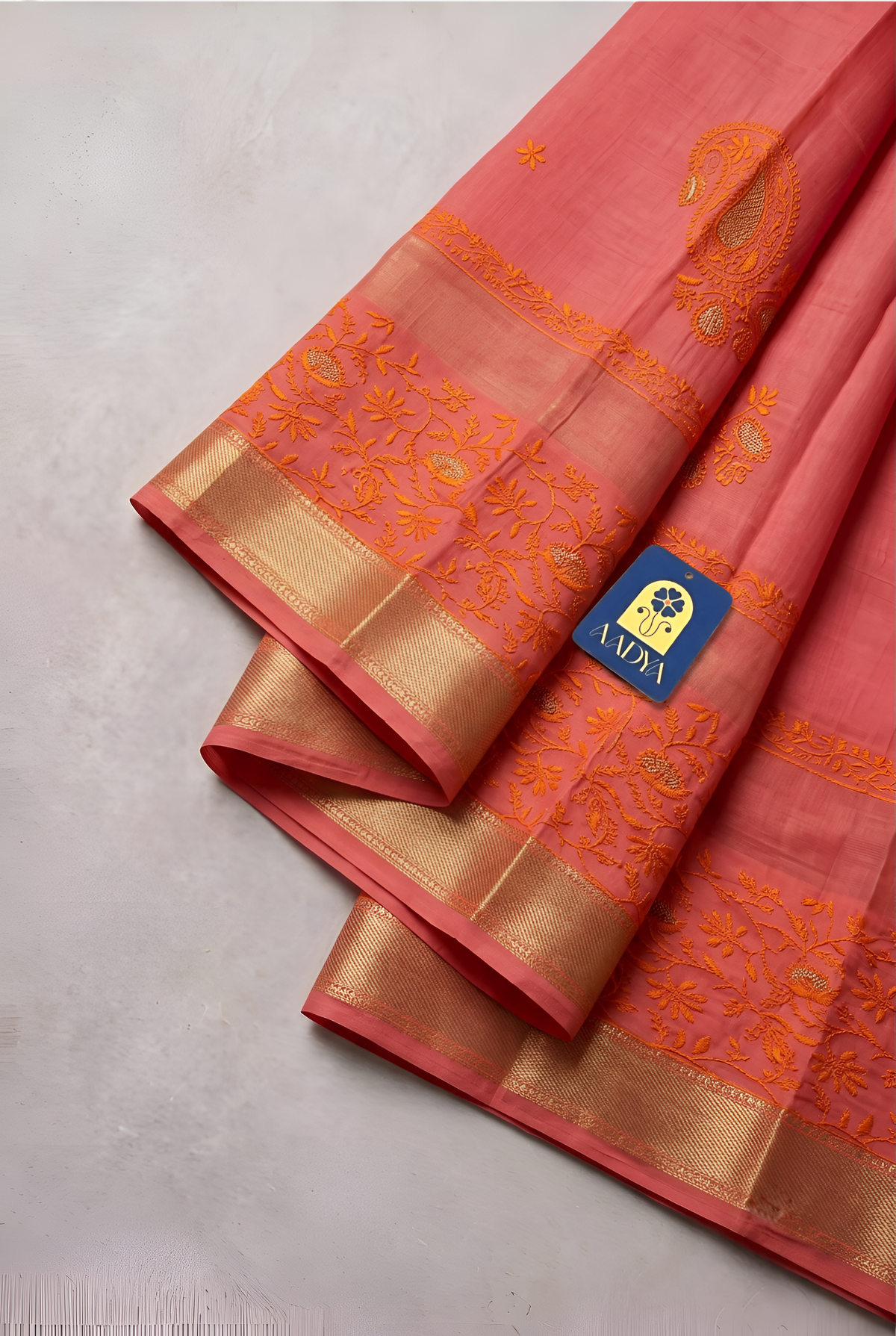 Pink Chanderi Silk Saree with Orange Floral Meenakari Buttis & Zari Pallu
