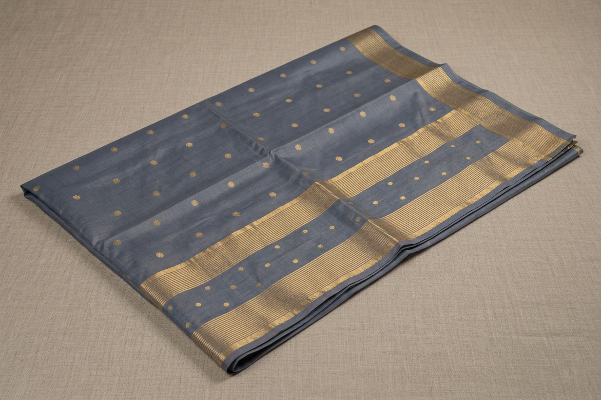 Grey Chanderi Tissue Silk Saree with Silver Zari Buttis & Gold Geometric Border