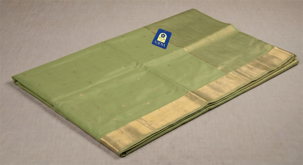Pista Green Chanderi Silk Saree with Flower Buttis & Navy Blue Zari Border